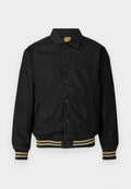 Schwarze Jeansjacke mit Knopfverschluss, gerippten Bündchen und elastischem Saum. Verfügt über einen Kragen und Seitentaschen.