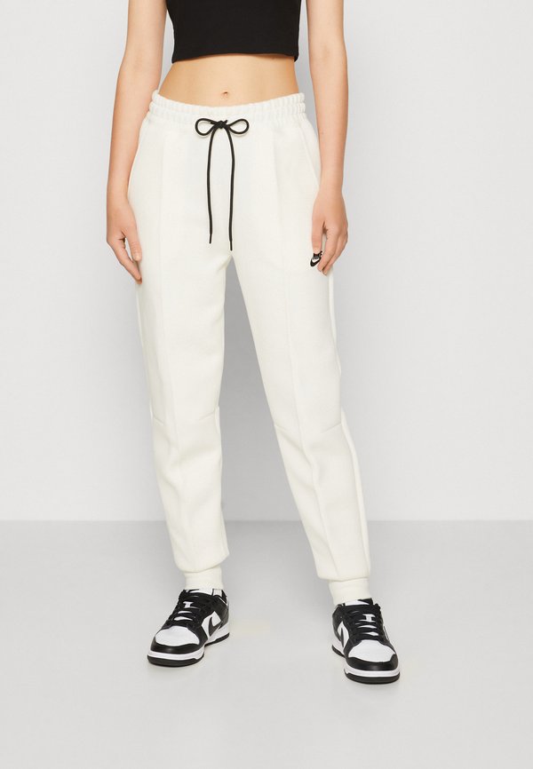Nike Sportswear Tracksuit bottoms - pale ivory/black
