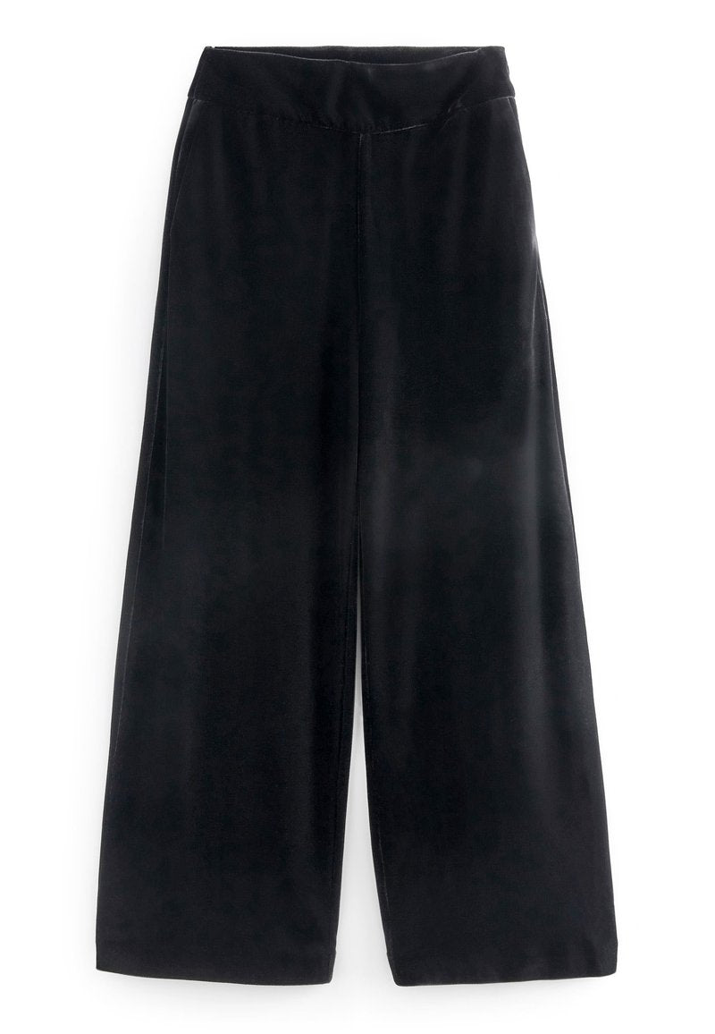 Schwarze weit geschnittene Hose aus weichem, glattem Stoff. Mit hoher Taille und einem elastischen Bund für zusätzlichen Komfort. Keine Taschen oder auffälligen Muster.
