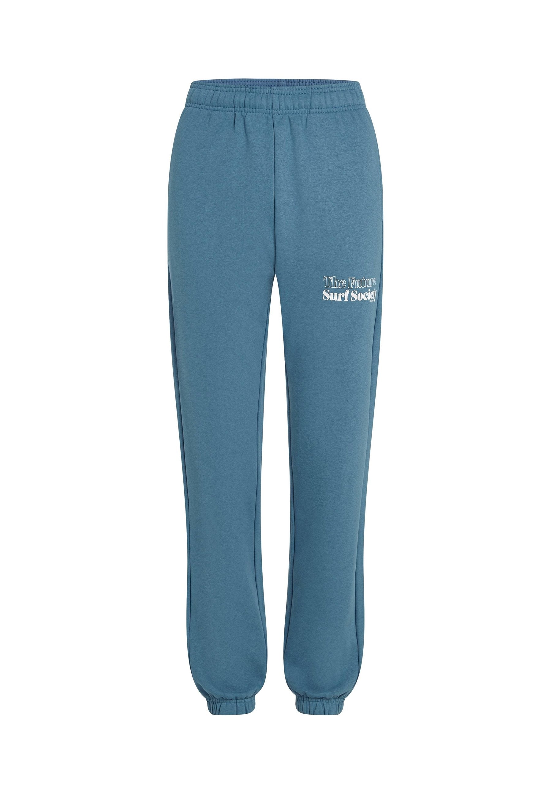 Blaue Sweatpants mit elastischem Bund und enganliegenden Knöcheln sowie weißem Text "The Future Surf Society" auf dem oberen linken Bein.