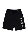 Schwarze Baumwollshorts mit einem Kordelzugbund, verziert mit weißen grafischen Symbolen und dem Wort "FREIHEIT", das auf dem linken Bein gedruckt ist.