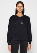 Schwarzer Pullover aus weichem Stoff mit "MEXX" in glänzenden Pailletten auf der Brust. Lange Ärmel mit gerippten Bündchen und Saum.