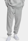 Under Armour ICON FLEECE - Tracksuit bottoms - grau