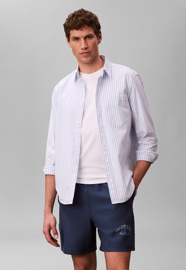Calvin Klein Jeans JOGGER - Tracksuit bottoms - dark denim