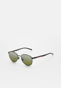 Rundrahmen-Sonnenbrille mit schwarzen Metallfassungen, grünem Verlaufsglas, schwarzen Bügeln und roter "Porsche Design"-Markierung auf den Armen.