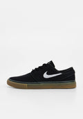 Schwarze Canvas-Sneaker mit weißem Nike-Swoosh, Schnürdesign, flacher Gummisohle und strukturiertem Obermaterial aus Stoff.
