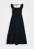 Schwarzes Kleid aus weichem Stoff, mit Rüschen-Trägern, einem taillierten Oberteil und einem gestuften Rockdesign. Verstellbare Bindung im Nacken hinten.