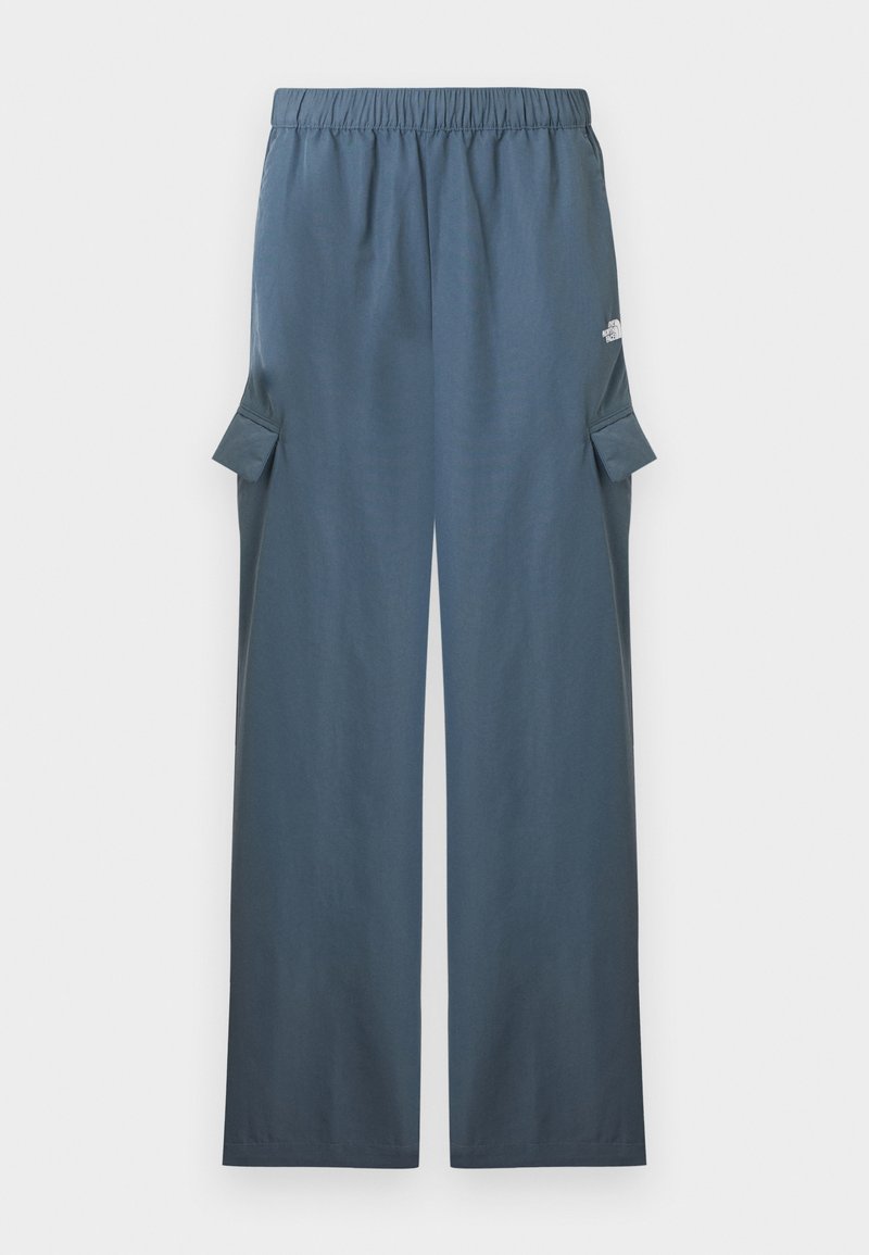 Dunkelblaue Cargo-Hose mit weitem Bein, elastischem Bund und Klappentaschen an den Seiten, Markenlogo am oberen Oberschenkel.
