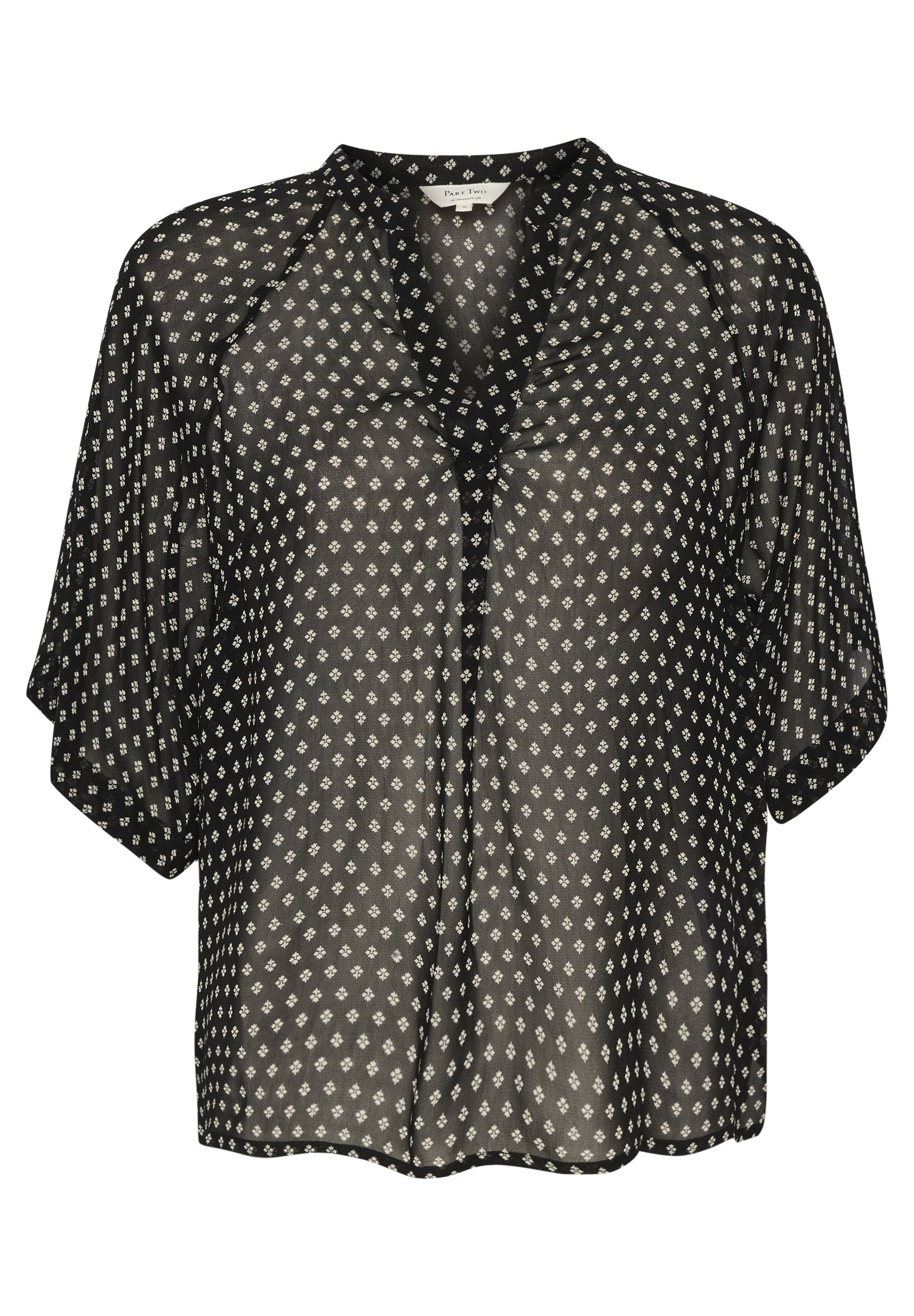 Schwarze durchsichtige Bluse mit V-Ausschnitt und kurzenÄrmeln, mit einem weißen Diamantenmuster und Knopfverschluss vorne. Leichter Stoff.