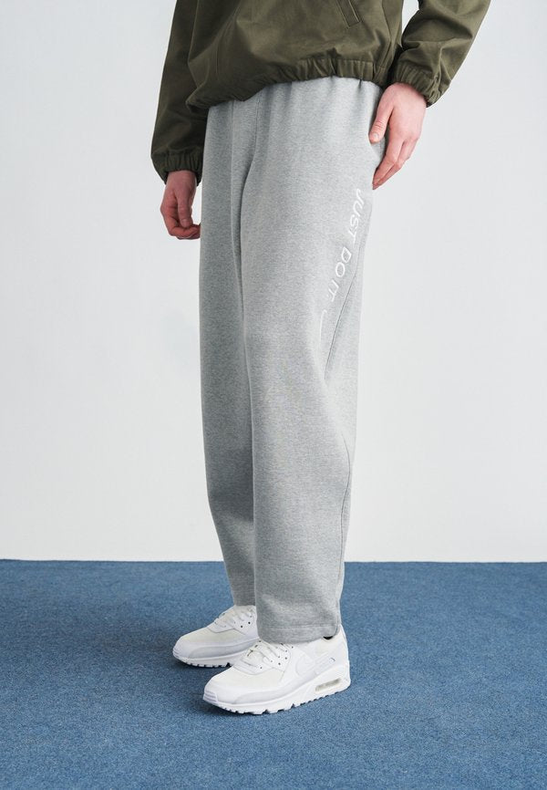 Nike Sportswear Tracksuit bottoms - grey heather/smoke grey/white