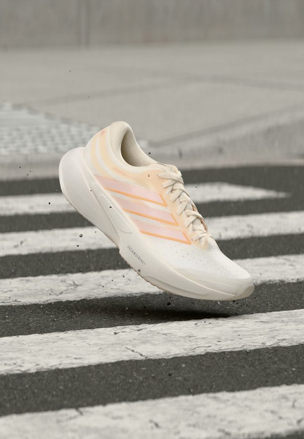 adidas Performance SUPERNOVA SOLUTION 3 - Road running shoes - chalk white/acid orange