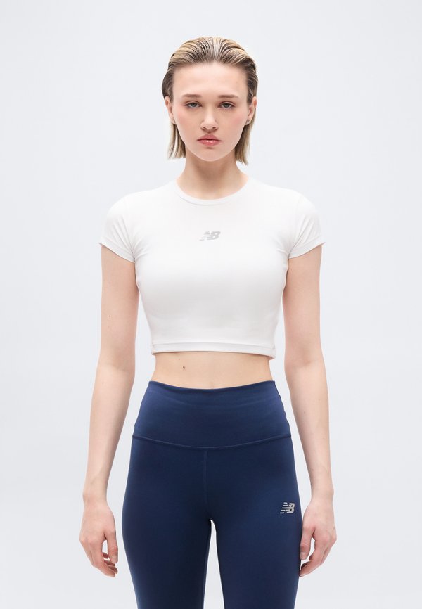New Balance HARMONY - Sports T-shirt - white