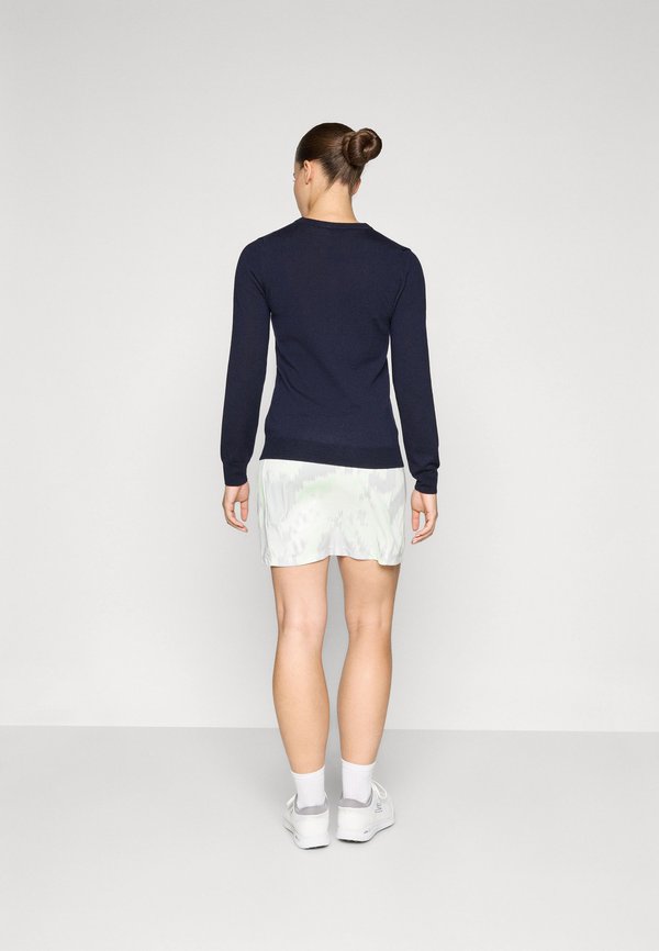 J.LINDEBERG Sports AMELIE MID PRINT SKIRT