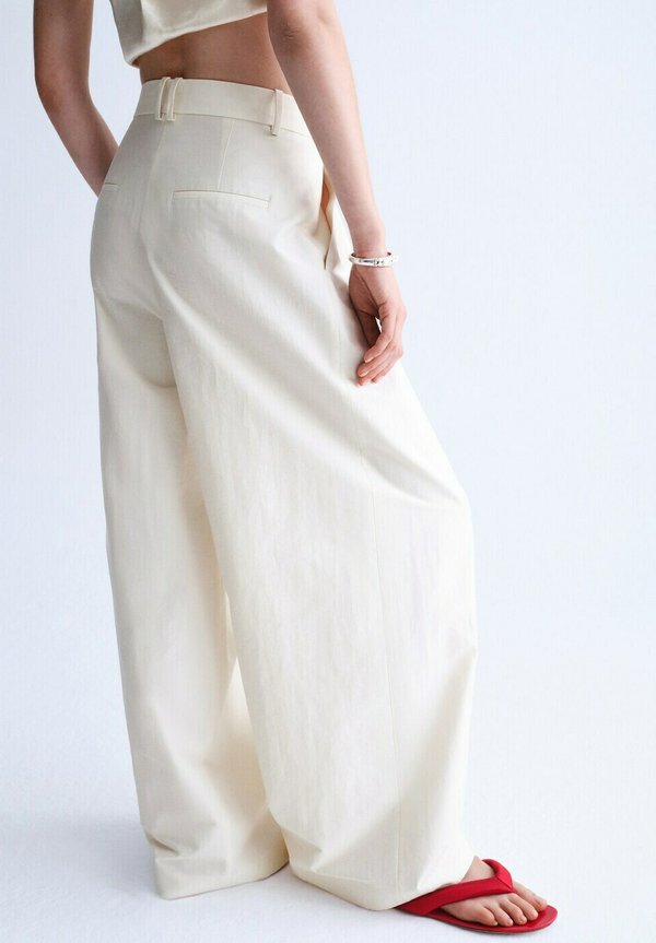 Mango ADULT - Trousers - beige