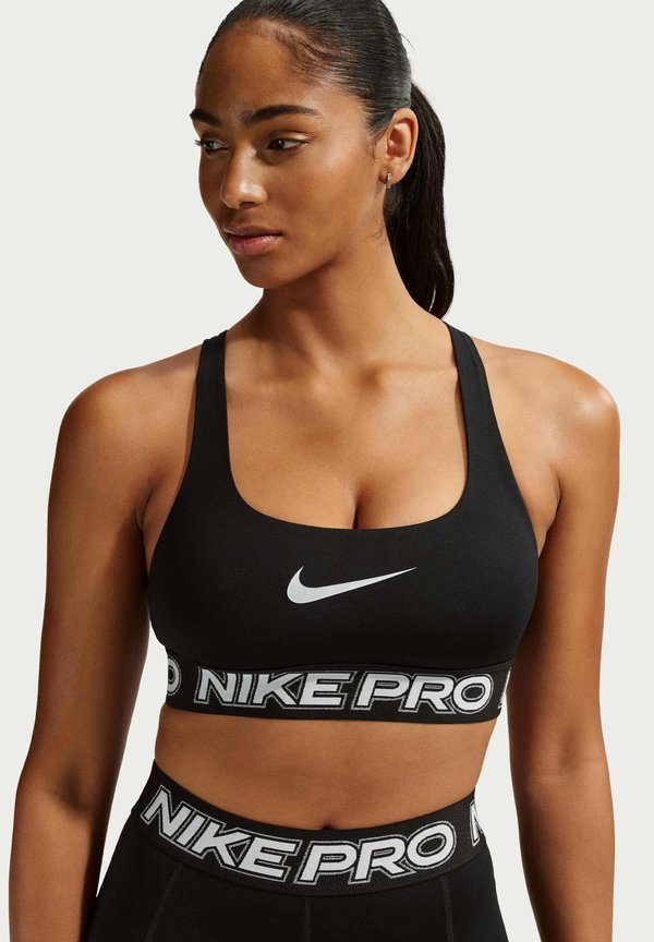 Nike Performance W NP DF BRA TT GRX - Medium support sports bra - black/white/metallic silver