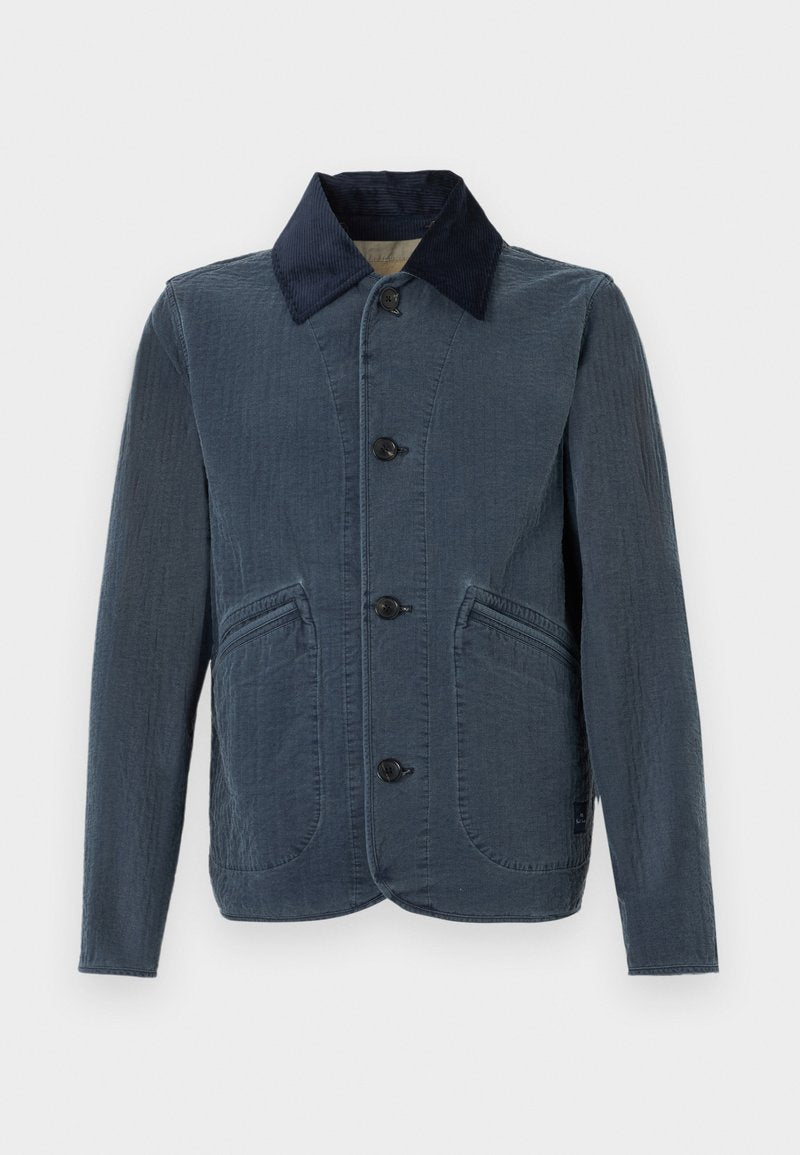 Dunkelblaue Jacke aus strukturiertem Stoff, mit Knopfverschluss, großen aufgesetzten Taschen vorne und einem kontrastierenden Cordkragen.