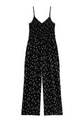 Schwarzer Jumpsuit mit weißen Punkten, gerafftem Oberteil, dünnen Trägern und weitem Bein-Design. Verfügt über einen Taillengürtel zur Anpassung.