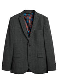 Grau strukturierte Blazer mit Reverskragen, Ein-Knopf-Verschluss und floral gemustertem Innenfutter. Zwei Fronttaschen und geknöpfte Manschetten.