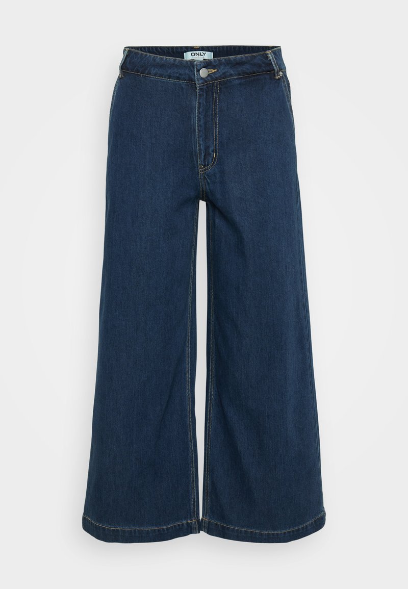 Weite Denim-Hose in Dunkelblau. Mit Knopfverschluss, fünf Taschen, heller Naht und glattem Material.