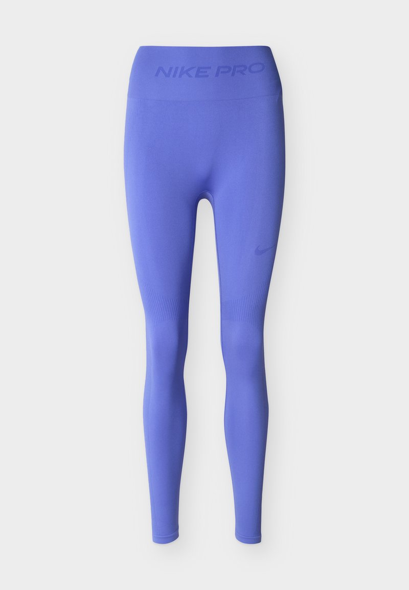 Lila Nike Pro nahtlose Kompressionsleggings mit hohem Bund und dezentem Logo am Oberschenkel.