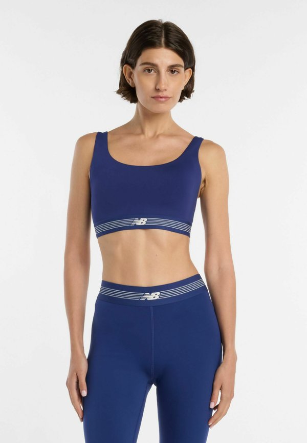 New Balance AC TRAIN BRA - Medium support sports bra - blue oyster