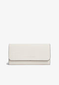 Tommy Hilfiger METALLIC LOGO TEXTURED FLAP WALLET - Wallet - soft cream
