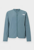 Hellblaues Langarm-Jacke mit Reißverschluss, kragenlosem Ausschnitt und weißem The North Face-Logo auf der oberen linken Brust.