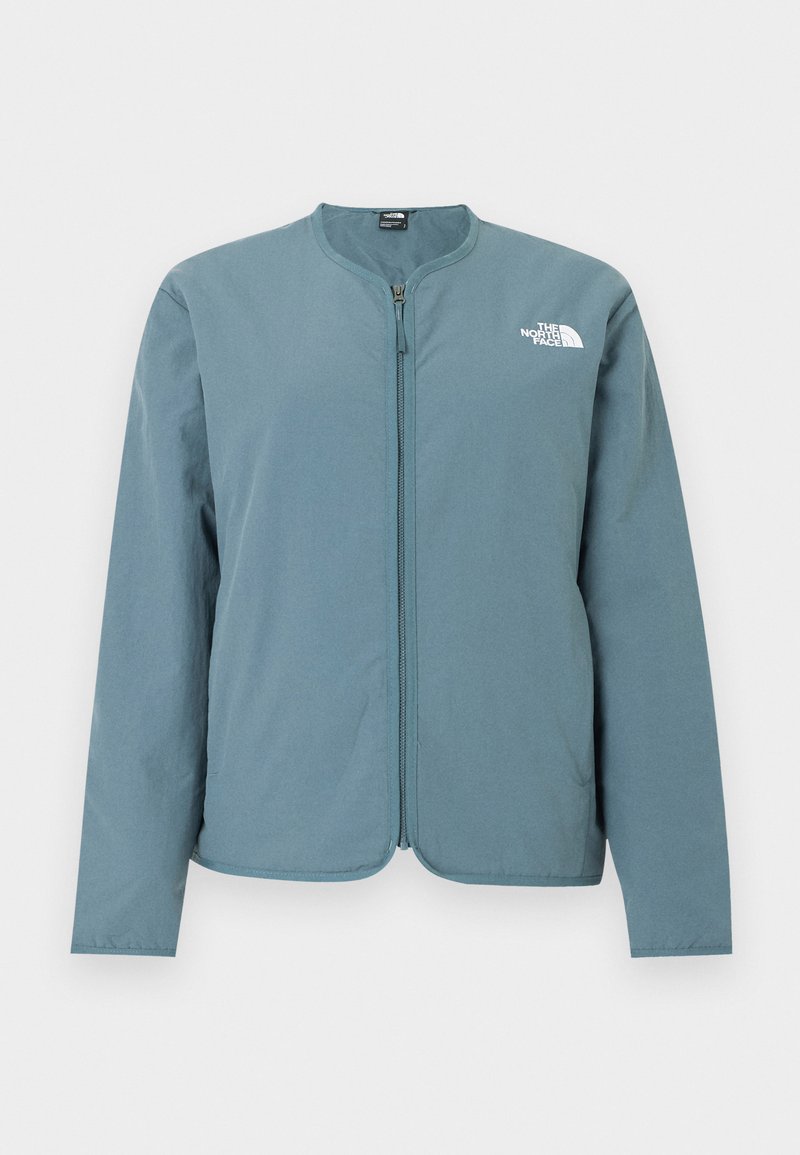 Hellblaues Langarm-Jacke mit Reißverschluss, kragenlosem Ausschnitt und weißem The North Face-Logo auf der oberen linken Brust.