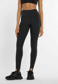 New Balance NB SLEEK HIGH RISE STIRRUP LEGGING - Leggings - Trousers - black