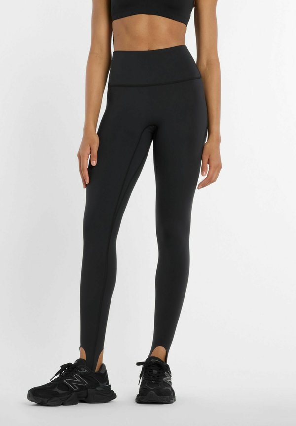 New Balance NB SLEEK HIGH RISE STIRRUP LEGGING - Leggings - Trousers - black