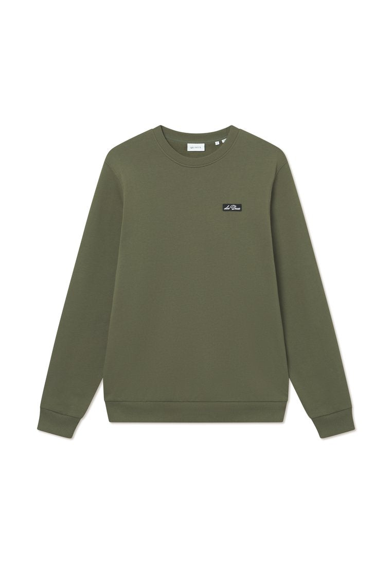 Olivegrünes Sweatshirt aus Baumwollmischung, mit Rundhalsausschnitt, langen Ärmeln, gerippten Bündchen und einem kleinen Markenpatch auf der Brust.