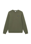 Olivegrünes Sweatshirt aus Baumwollmischung, mit Rundhalsausschnitt, langen Ärmeln, gerippten Bündchen und einem kleinen Markenpatch auf der Brust.
