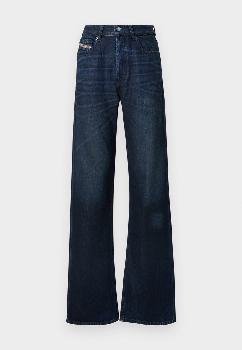 Dunkelblaue Jeans mit weitem Bein aus Denim. Verfügt über einen Knopfverschluss, ein Fünf-Taschen-Design und dezentes Verblassen auf der Vorderseite.