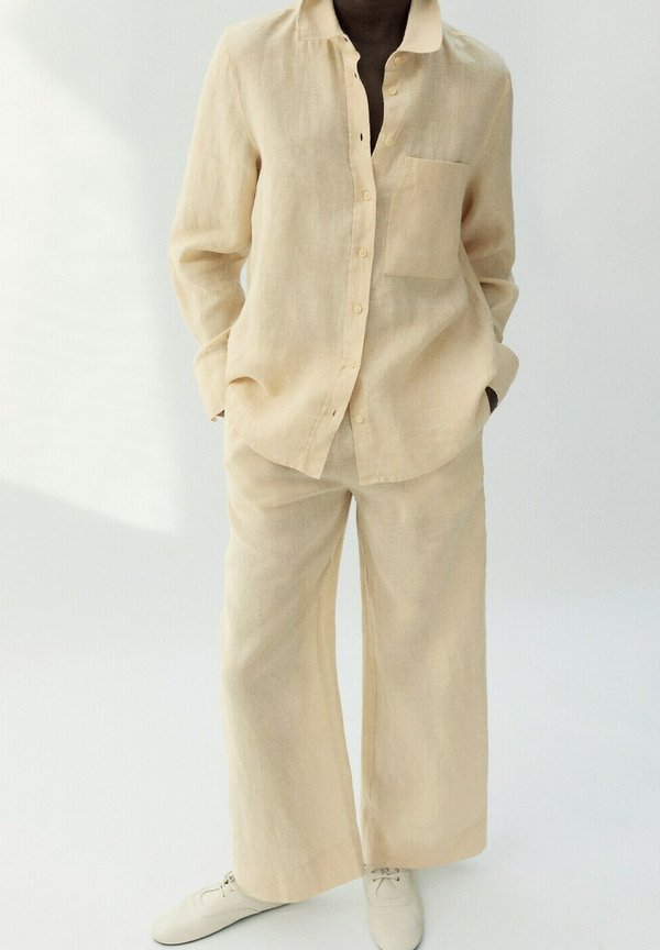 Mango ADULT - Trousers - light yellow