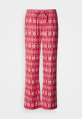 Rote Pyjamahose mit weißen Blumen- und geometrischen Mustern, elastischem Bund mit Kordelzug, weitem Bein, aus weichem Stoff gefertigt.