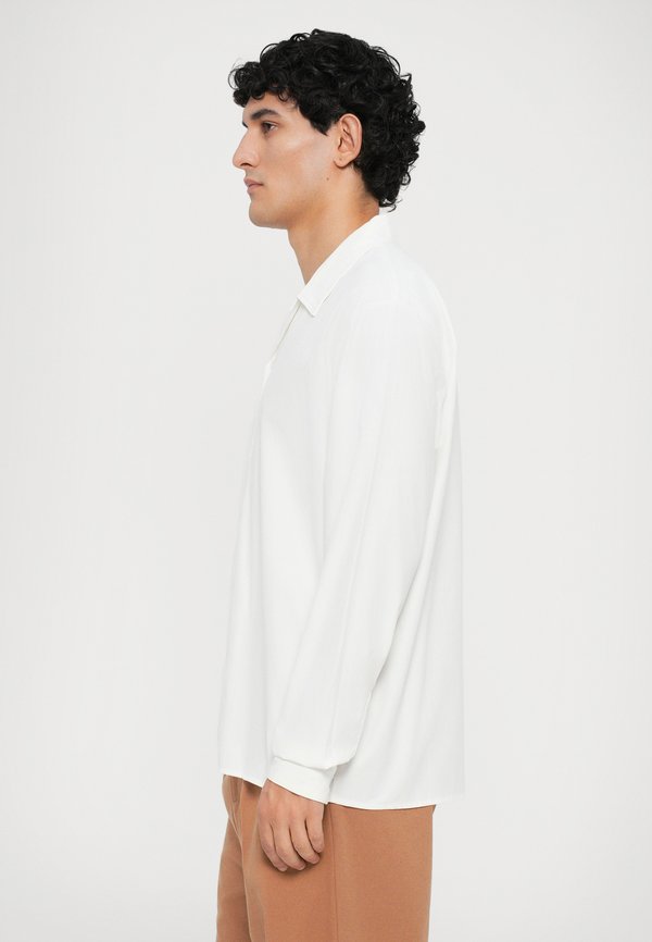 Essential Collective SHIRT