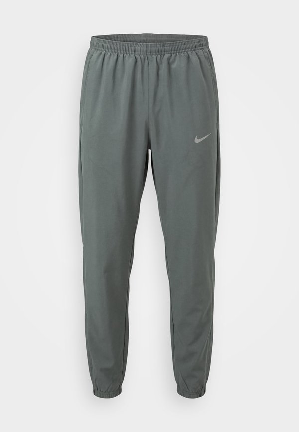 Nike Performance MILER - Tracksuit bottoms - smoke grey