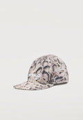 Baseballcap mit beigem und schwarzem Schlangenhautmuster und weiß gesticktem Text "ANKO" auf der Vorderseite, vor schlichtem hellem Hintergrund.