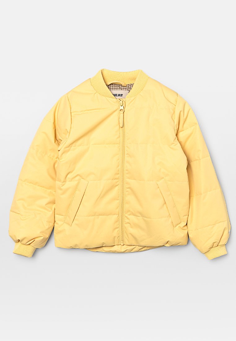 Gelbe Puffy-Jacke aus glattem Material, mit Reißverschluss, gerippten Bündchen und zwei Fronttaschen. Leicht und in einem kastenförmigen Schnitt.