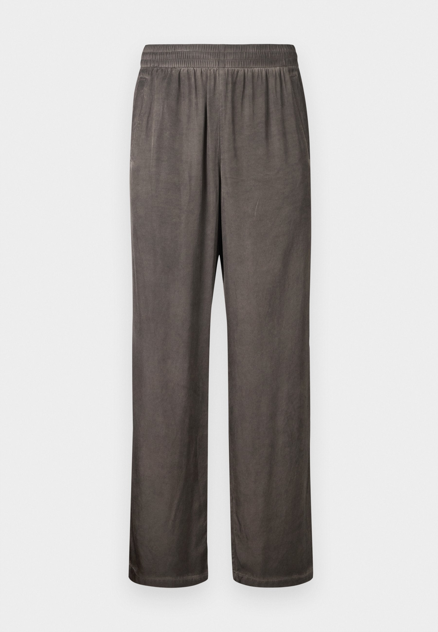 Weit geschnittene, dunkelgraue Wildlederhose mit elastischem Bund und Seitentaschen, flach liegend vor weißem Hintergrund gezeigt.