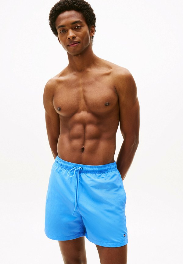Tommy Hilfiger ESSENTIAL MID LENGTH - Swimming shorts - blue spell
