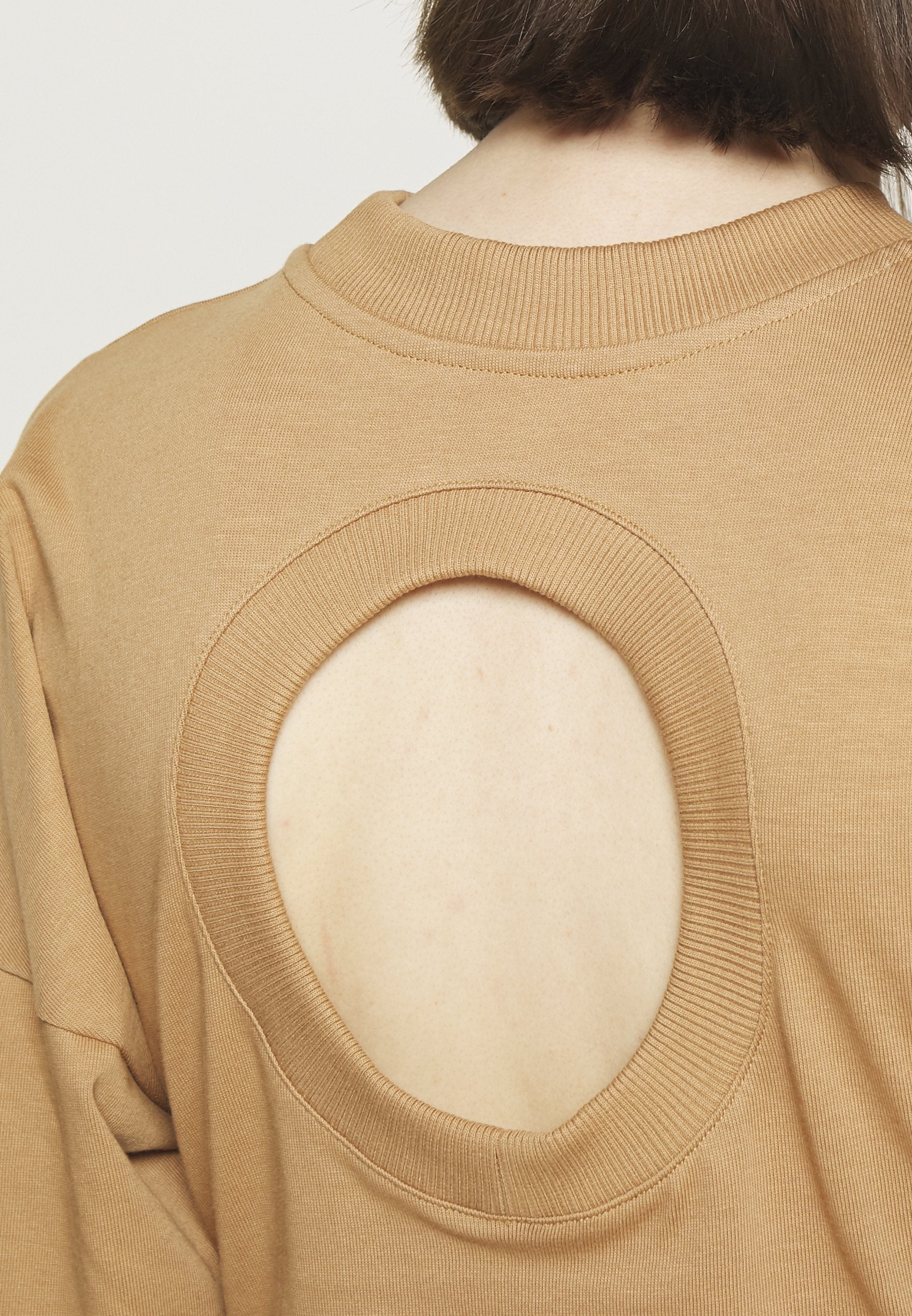 A.W.A.K.E. MODE LONG SLEEVE WITH CUT OUT DETAIL