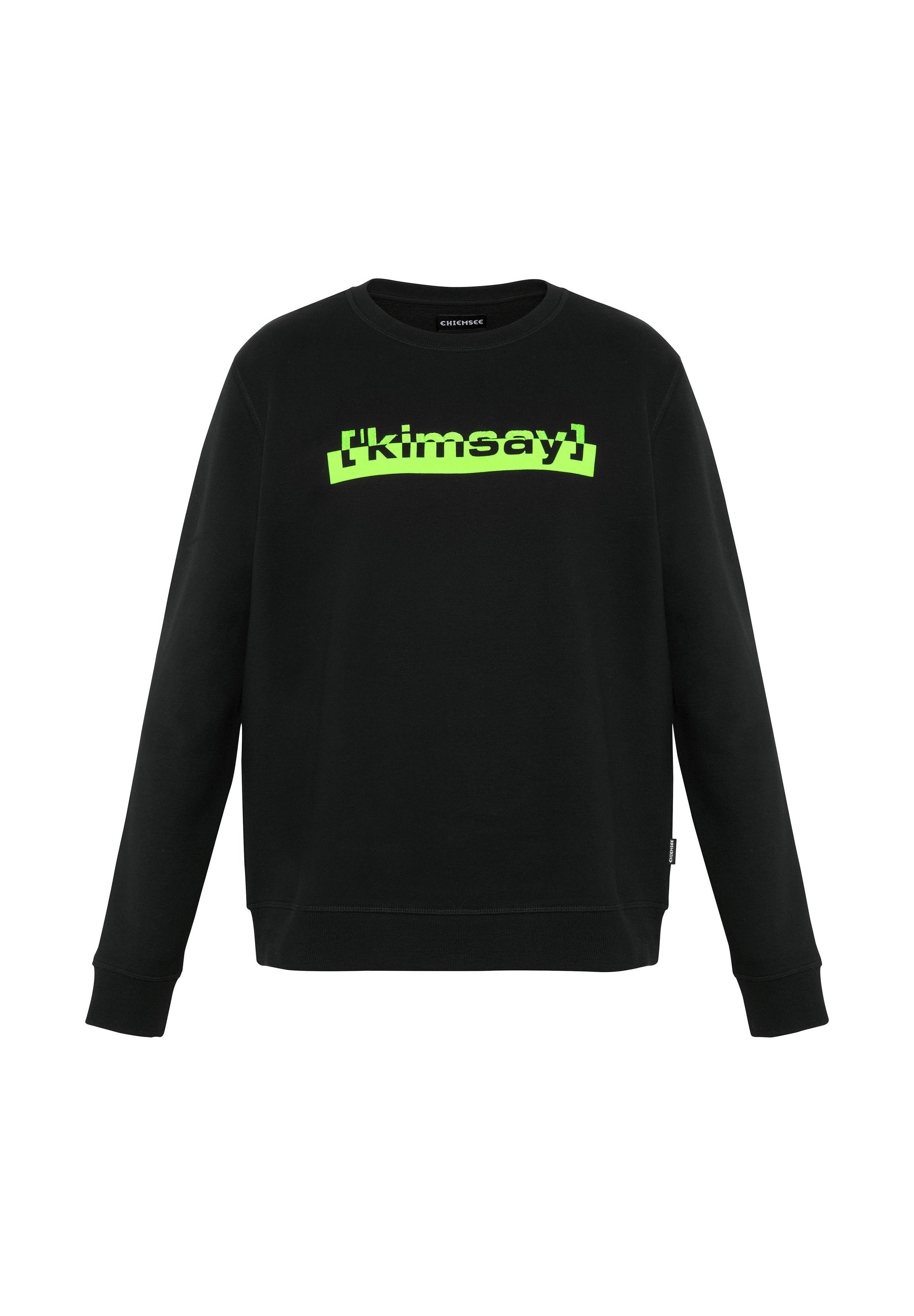 Schwarzes Sweatshirt mit Rundhalsausschnitt, auf der Vorderseite mit einem neon-grünen grafischen Textdesign. Weicher Stoff und gerippte Bündchen.