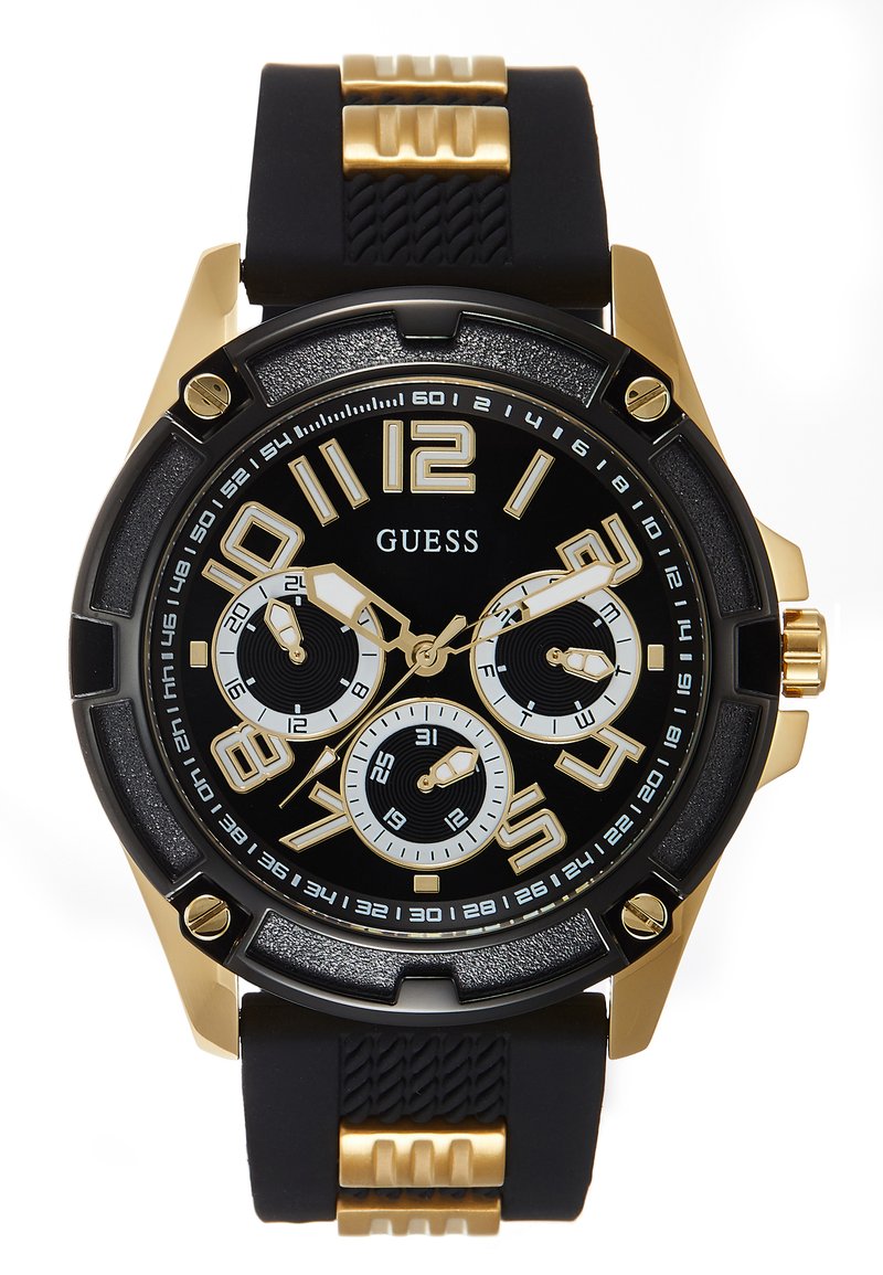 Schwarze Gummiband-Uhr mit goldenen Akzenten. Großes schwarzes Ziffernblatt mit weißen Unterziffern und kräftigen goldenen Zahlen. Strukturierte Oberfläche und Edelstahlbeschläge.