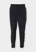 Nike Performance UNLIMITED - Tracksuit bottoms - black