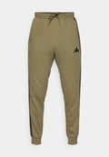 adidas Sportswear REGULAR FIT - Tracksuit bottoms - olive strata/black