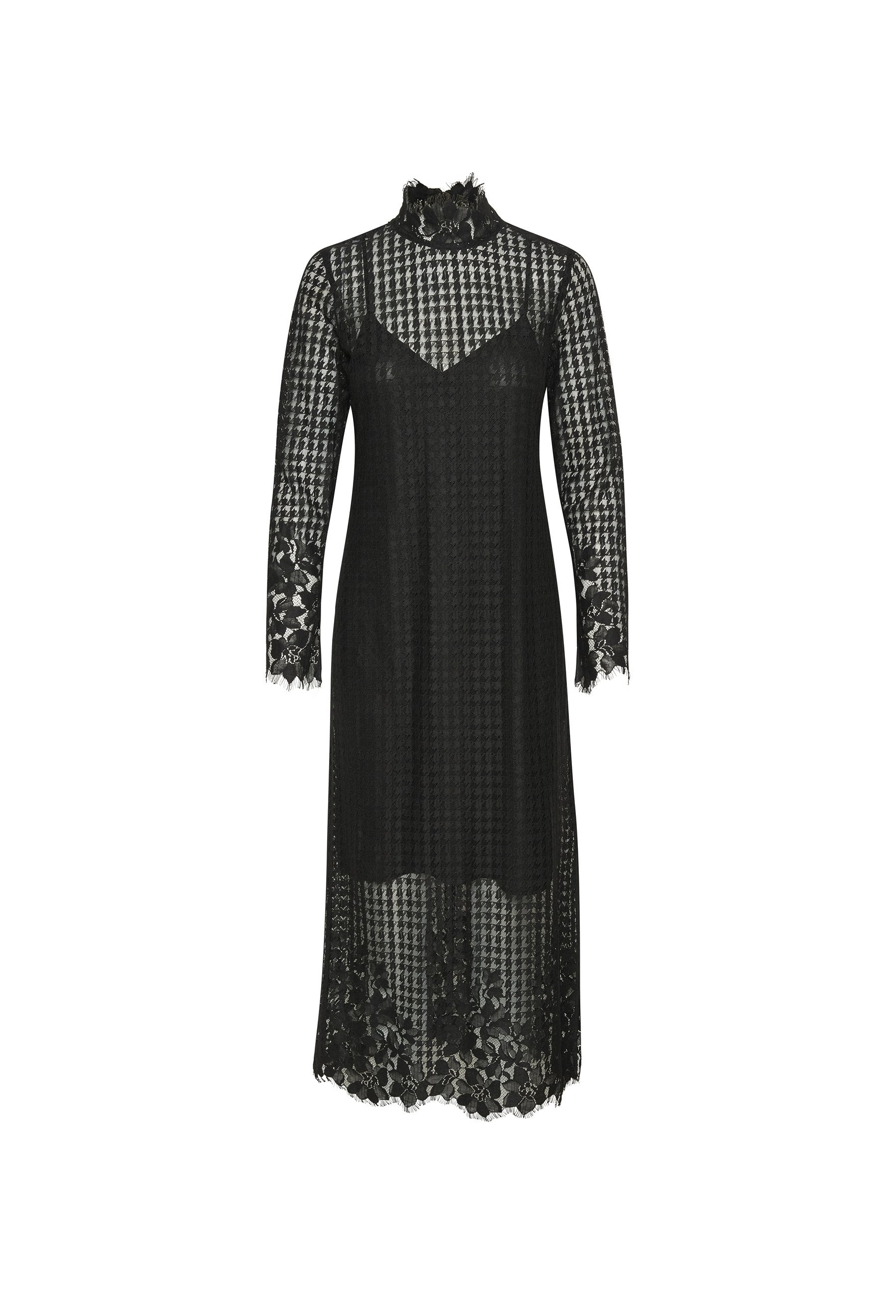Schwarzes langärmliges Spitzenkleid mit hohem Ausschnitt, floralen und Hahnentritt-Mustern sowie einem darunterliegenden Unterkleid.