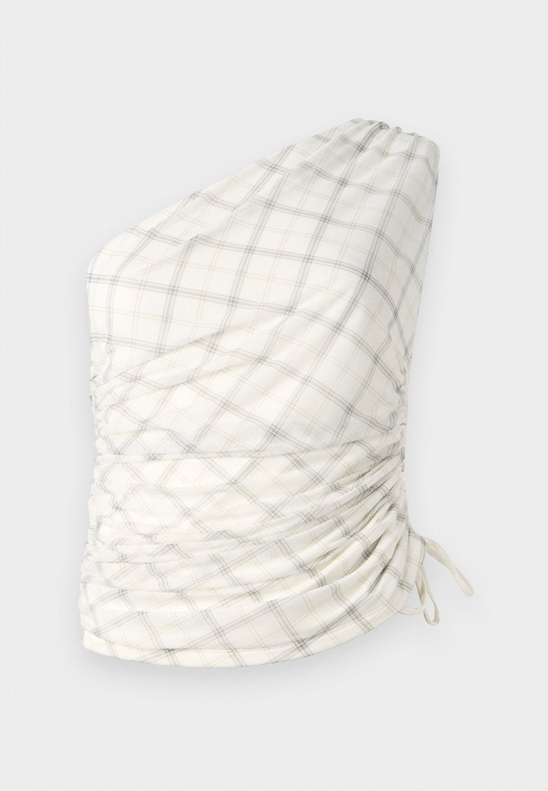 Ein asymmetrisches Oberteil mit einem leichten, karierten Muster aus Creme, Grau und dezentem Gelb. Verfügt über Raffung und Kordelzugakzente.