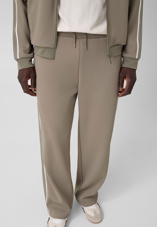 Guess JOGGER MIT SEITENSTREIFEN - Tracksuit bottoms - grün