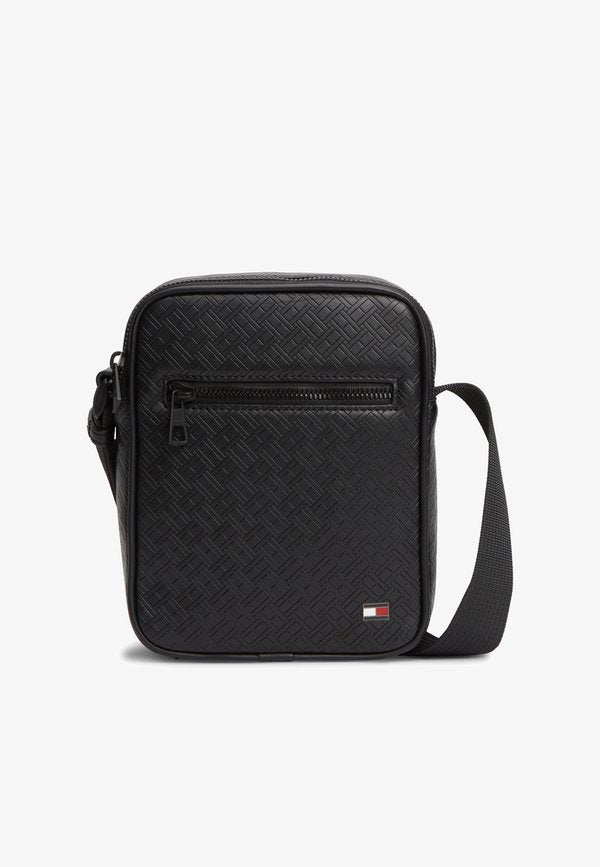 Tommy Hilfiger EMBOSSED FLAG CROSSBODY REPORTER BAG - Cross body bag - black